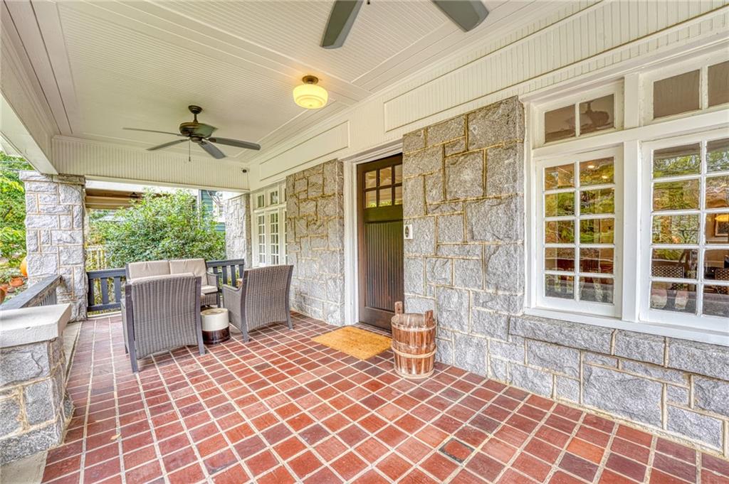 997 Blue Ridge Avenue Northeast Atlanta, GA 30306 - Photo 2 of 53 a bedroom with a bed and a large window