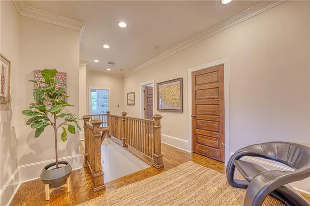 a view of a livingroom with furniture and staircase