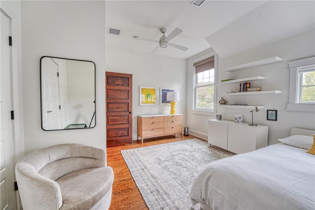 997 Blue Ridge Avenue Northeast Atlanta, GA 30306 - Photo 41 of 53 a bedroom with a bed and a couch