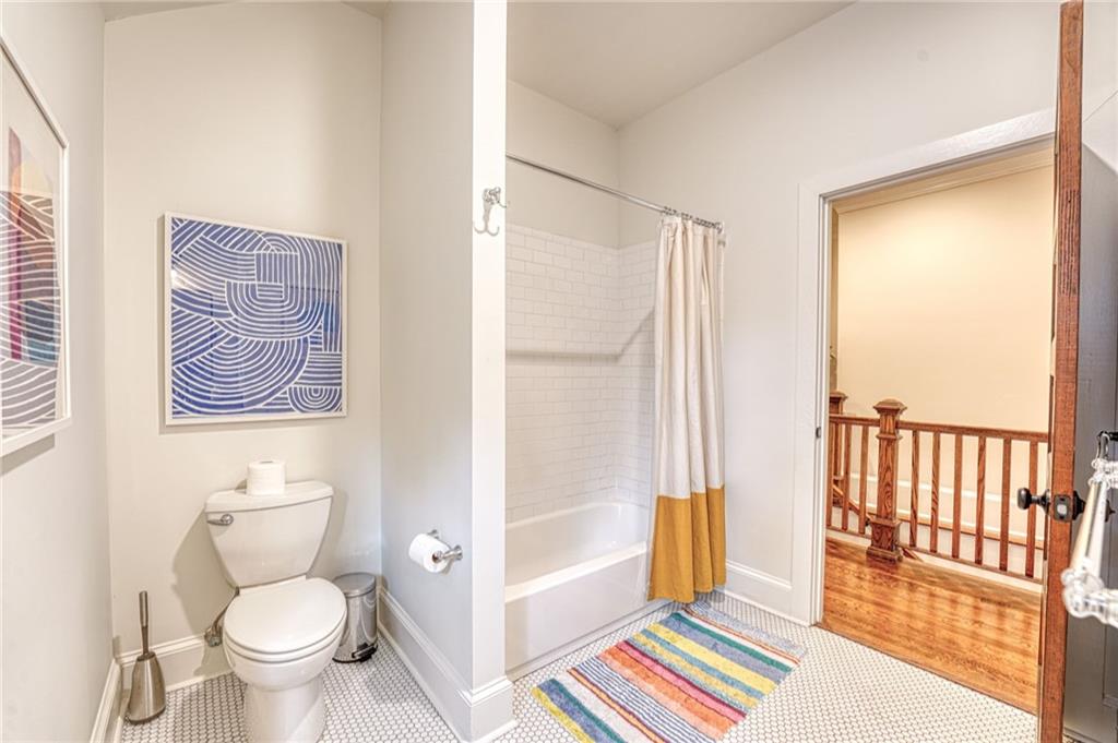 997 Blue Ridge Avenue Northeast Atlanta, GA 30306 - Photo 45 of 53 a bathroom with a toilet and a shower