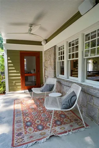 a front view of a house with a yard and a garage