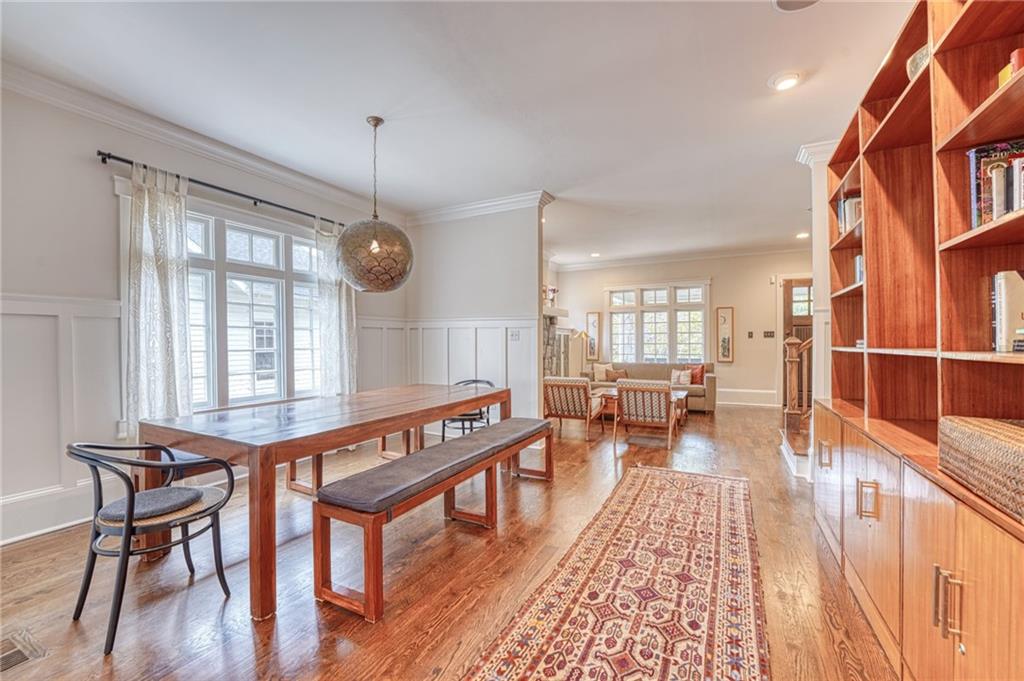 997 Blue Ridge Avenue Northeast Atlanta, GA 30306 - Photo 9 of 53 a view of a dining room with furniture window and wooden floor