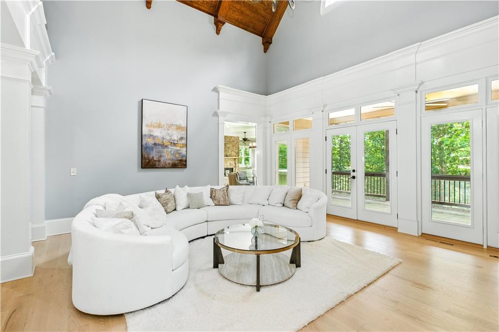 6225 Random Winds Bluff Gainesville, GA 30506 - Photo 12 of 96 a living room with furniture and a large window