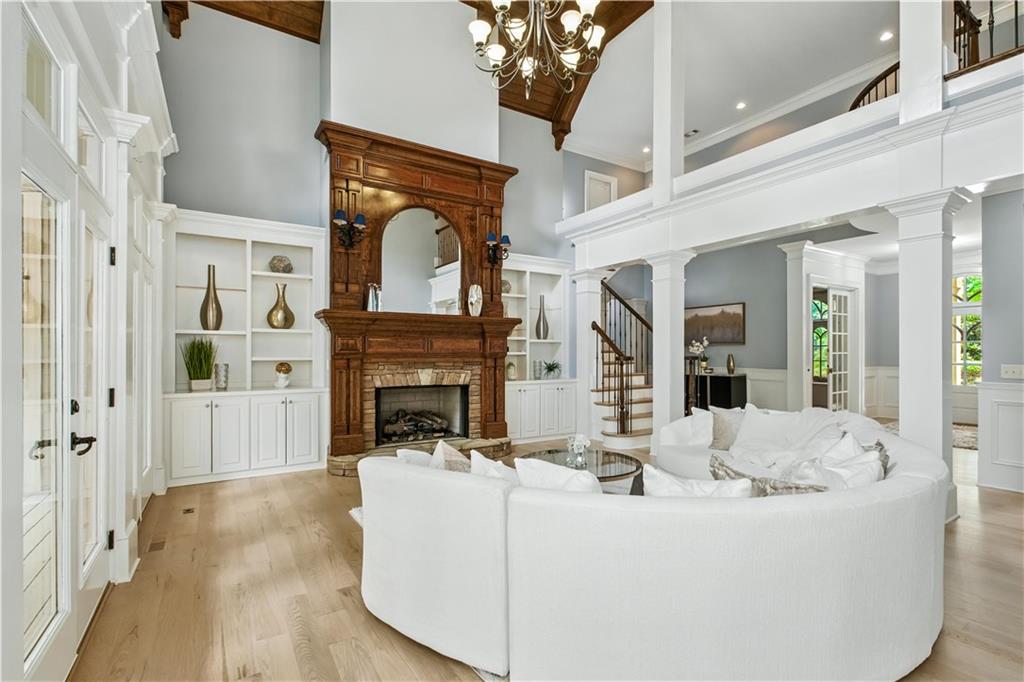6225 Random Winds Bluff Gainesville, GA 30506 - Photo 15 of 96 a living room with furniture and a fireplace
