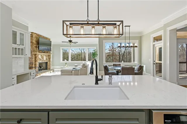 a bedroom with a large bed and a large window