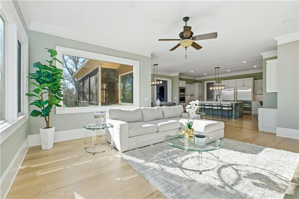 6225 Random Winds Bluff Gainesville, GA 30506 - Photo 31 of 96 a living room with furniture and a large window