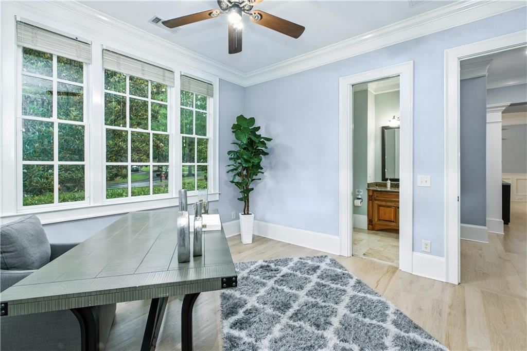 6225 Random Winds Bluff Gainesville, GA 30506 - Photo 36 of 96 a view of a dining room with furniture window and wooden floor