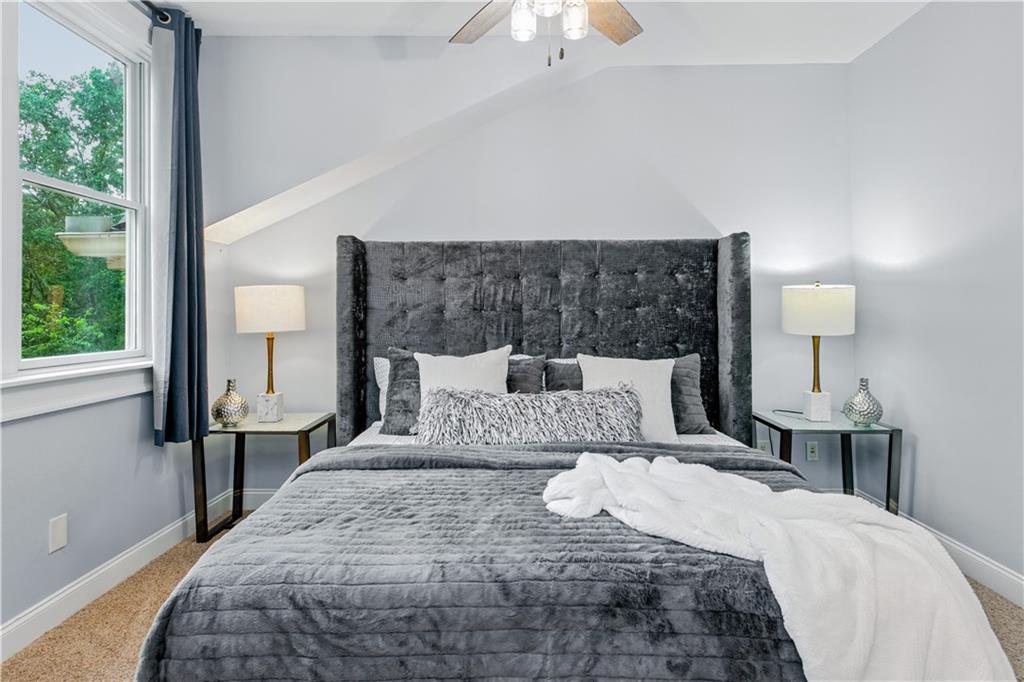 6225 Random Winds Bluff Gainesville, GA 30506 - Photo 51 of 96 a bedroom with a bed and window