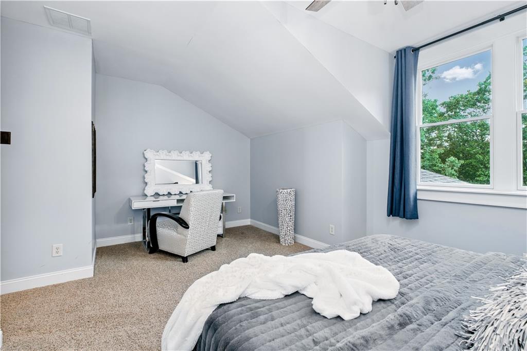 6225 Random Winds Bluff Gainesville, GA 30506 - Photo 52 of 96 a bedroom with a bed and wooden floor