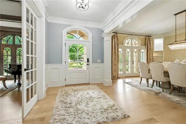 a view of a dining room with furniture window and outside view