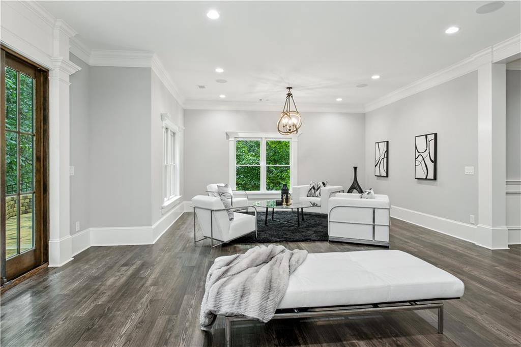 6225 Random Winds Bluff Gainesville, GA 30506 - Photo 62 of 96 a bedroom with a bed and wooden floor