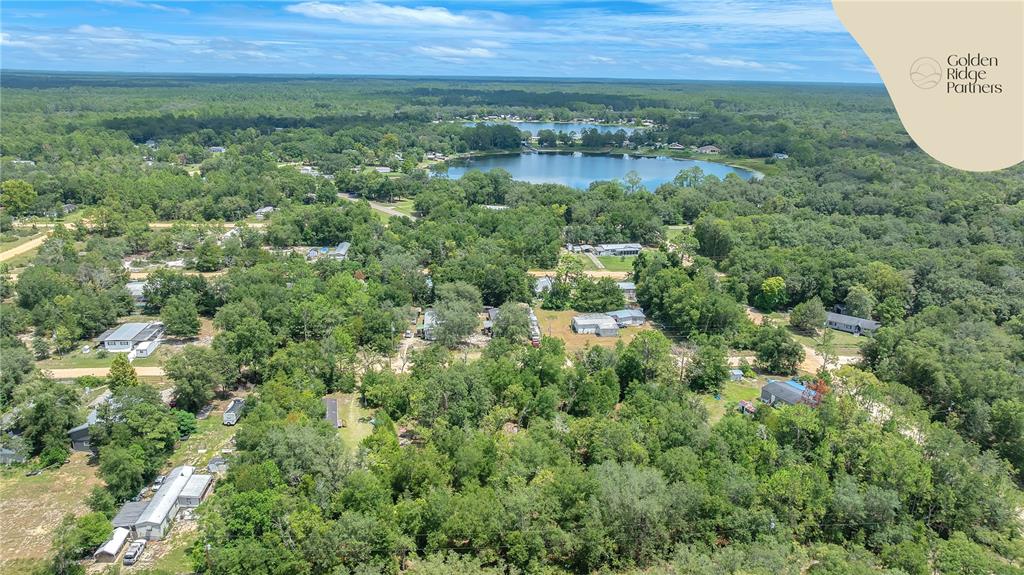 Dunham Avenue Interlachen, FL 32148 - Photo 17 of 28 an aerial view of residential houses with outdoor space and trees