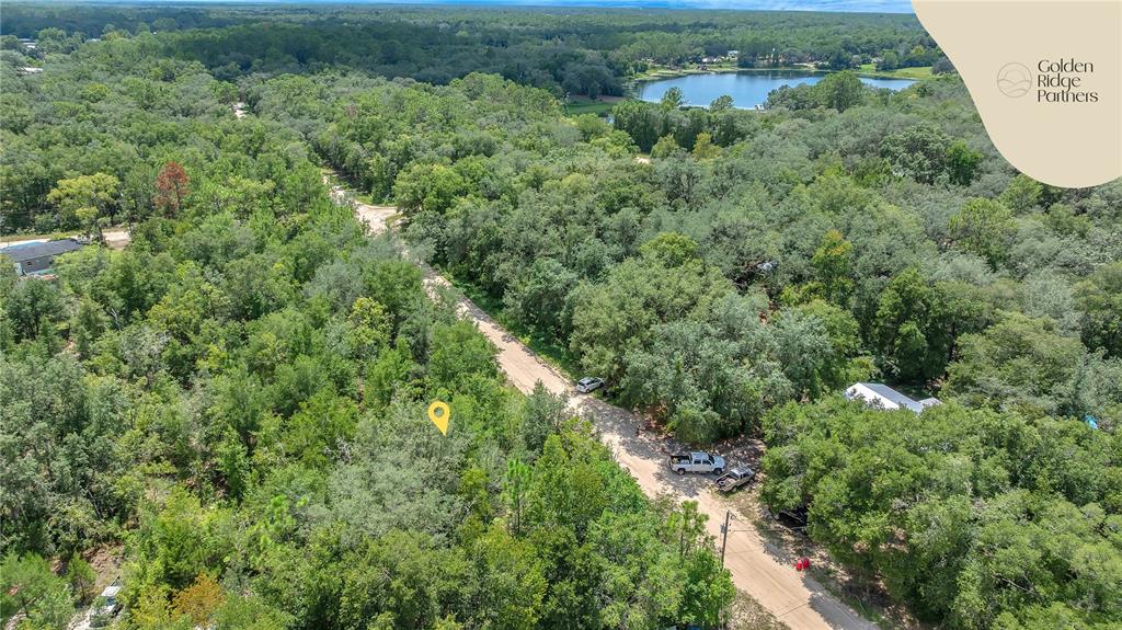 Dunham Avenue Interlachen, FL 32148 - Photo 4 of 28 an aerial view of residential houses with outdoor space and trees