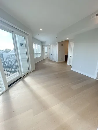 a view of livingroom with furniture and door
