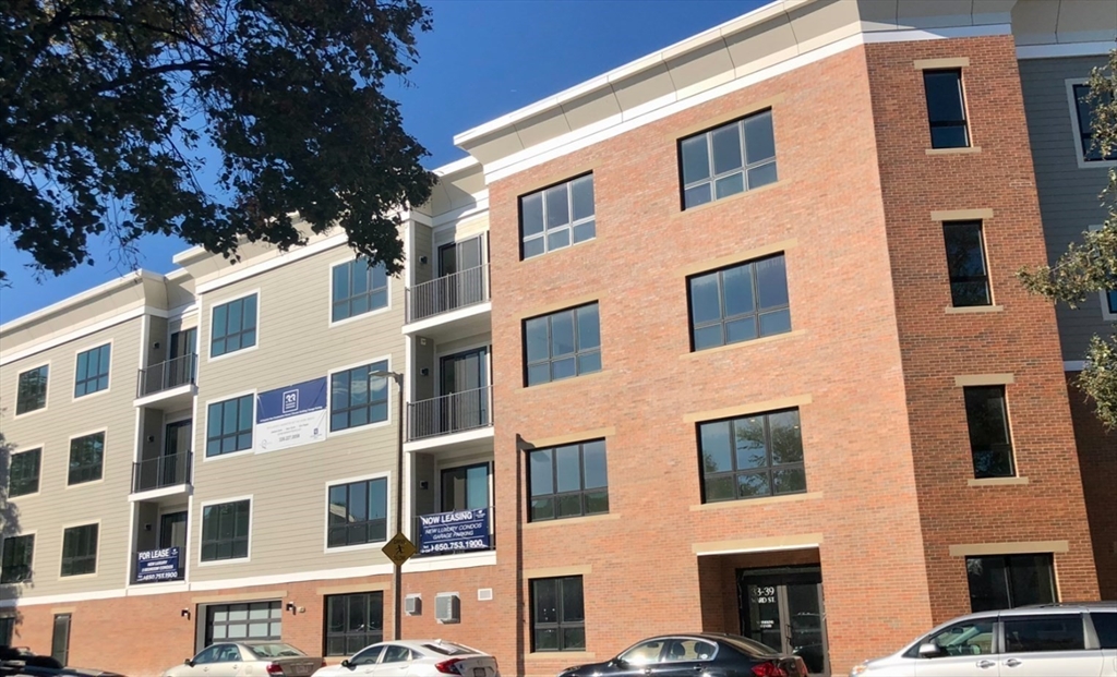 33 Ward Street, Unit 12 Boston, MA 02127 - Photo 15 of 19 a front view of a multi story building