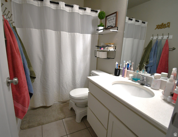 1688 West 200 North Mapleton, UT 84664 - Photo 15 of 18 Bathroom with vanity, curtained shower, and light tile patterned floors