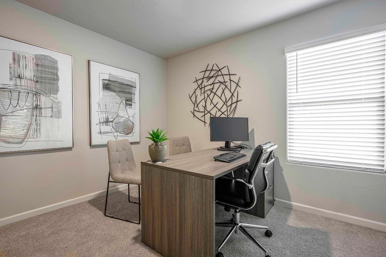 1553 Seneca Drive, Unit 86 Madera, CA 93637 - Photo 18 of 21 a view of a workspace with furniture and a window