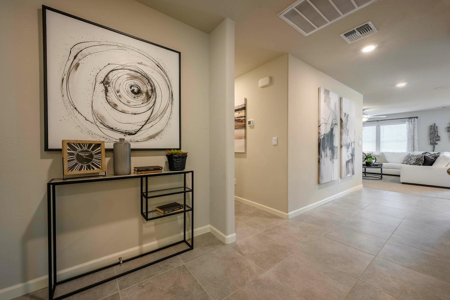 1553 Seneca Drive, Unit 86 Madera, CA 93637 - Photo 21 of 21 a view of a hallway with washer and dryer