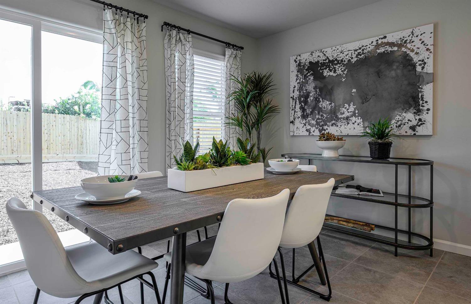 1553 Seneca Drive, Unit 86 Madera, CA 93637 - Photo 7 of 21 a view of a dining room with furniture window and outside view