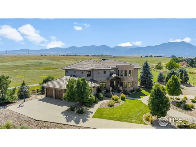 a view of a city with a lake