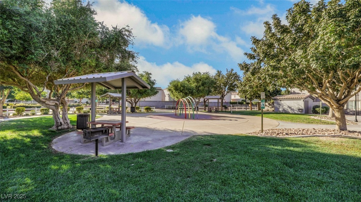 5940 High Steed Street, Unit 101 Henderson, NV 89011 - Photo 27 of 30 Surrounding community with a lawn and a patio area