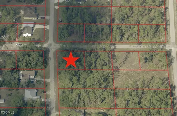 an aerial view of a houses with outdoor space