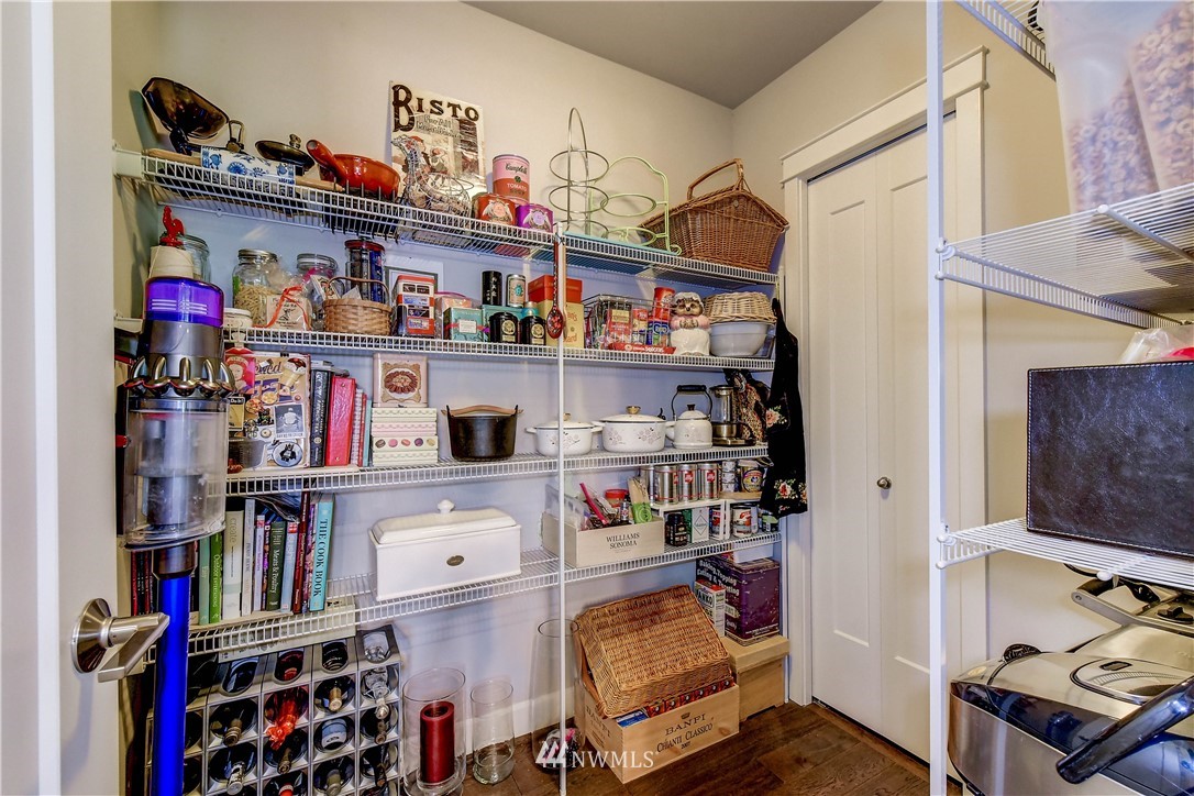 1607 233rd Street Southeast Bothell, WA 98021 - Photo 13 of 36 a shelf in a room with lots of books