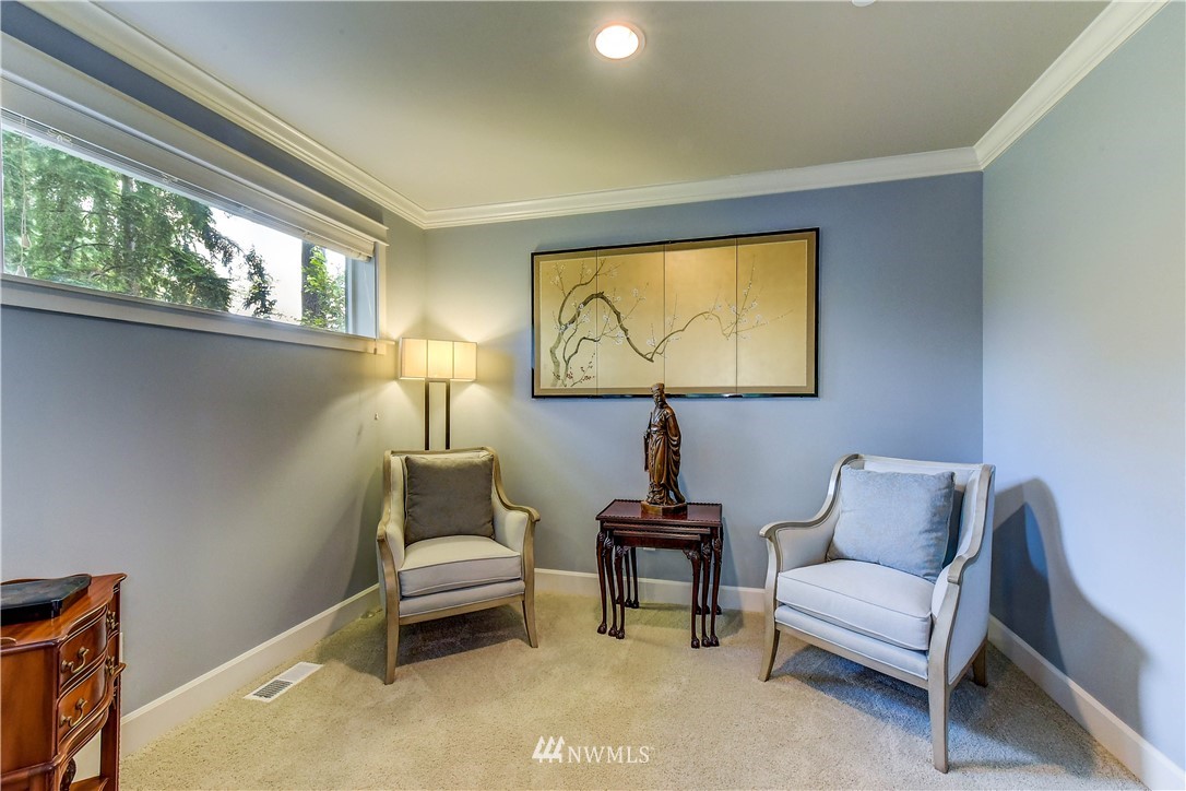 1607 233rd Street Southeast Bothell, WA 98021 - Photo 19 of 36 a bedroom with furniture and a window