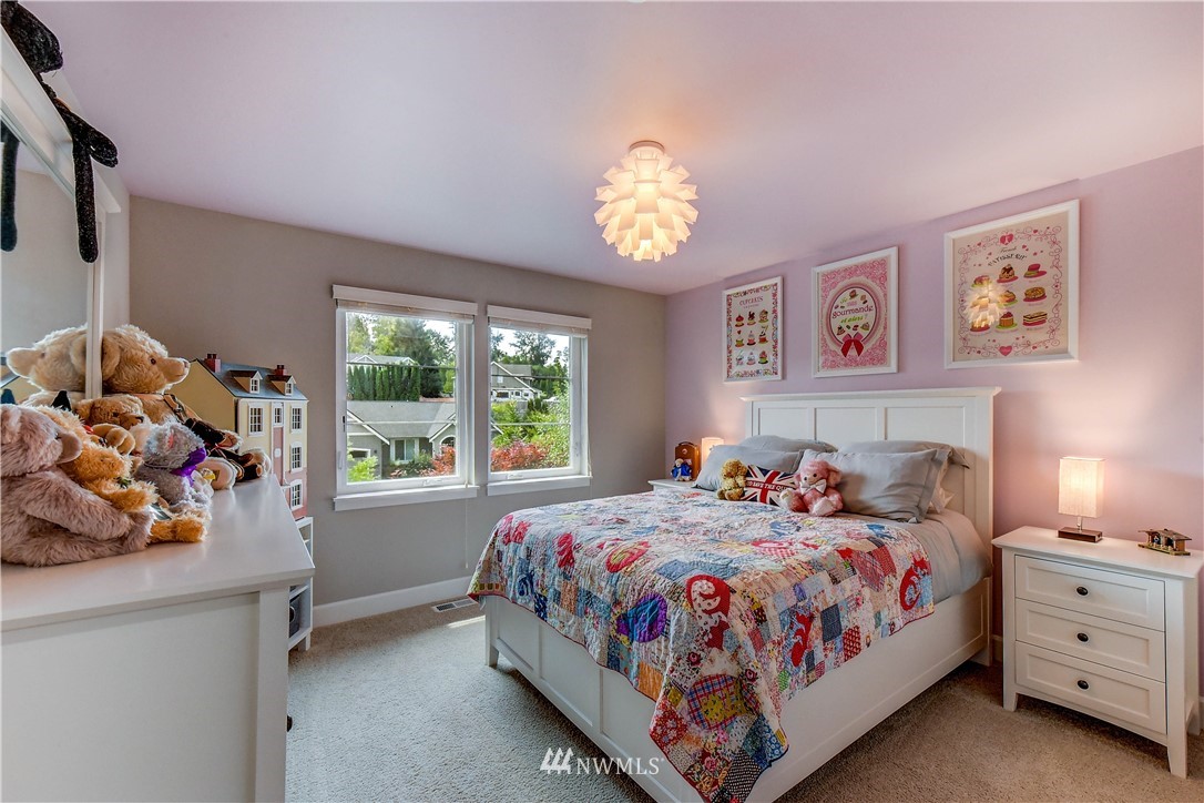 1607 233rd Street Southeast Bothell, WA 98021 - Photo 26 of 36 a bed room with a bed and a window