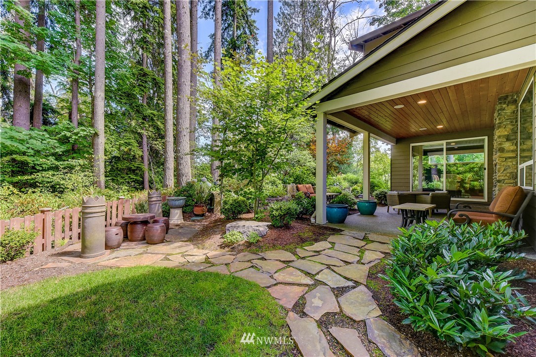 1607 233rd Street Southeast Bothell, WA 98021 - Photo 32 of 36 a view of a backyard with sitting area