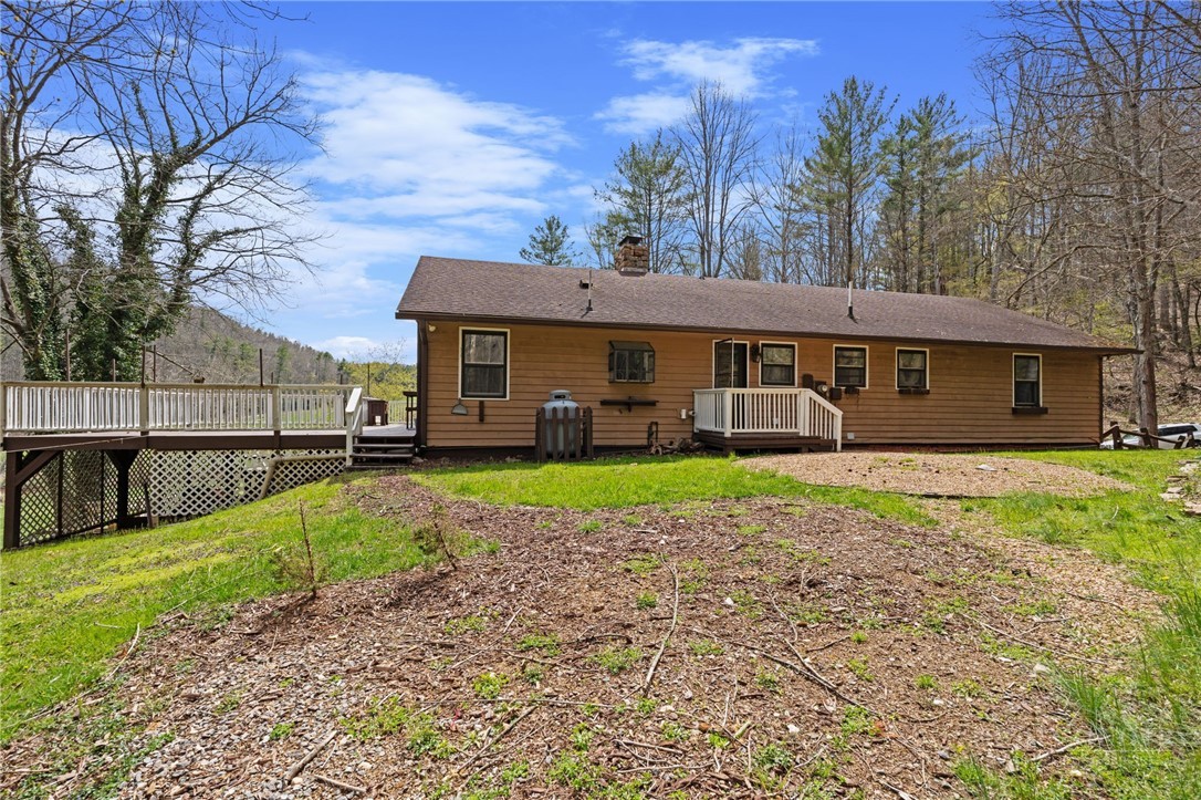 2345 Watauga River Road Sugar Grove, NC 28679 - Photo 38 of 50 a view of a house with a yard