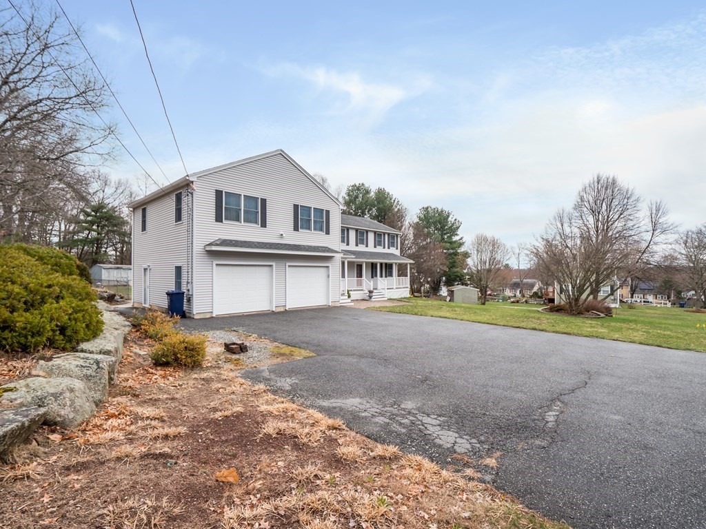 21 Partridge Road Dracut, MA 01826 - Photo 3 of 42 a house view with a outdoor space