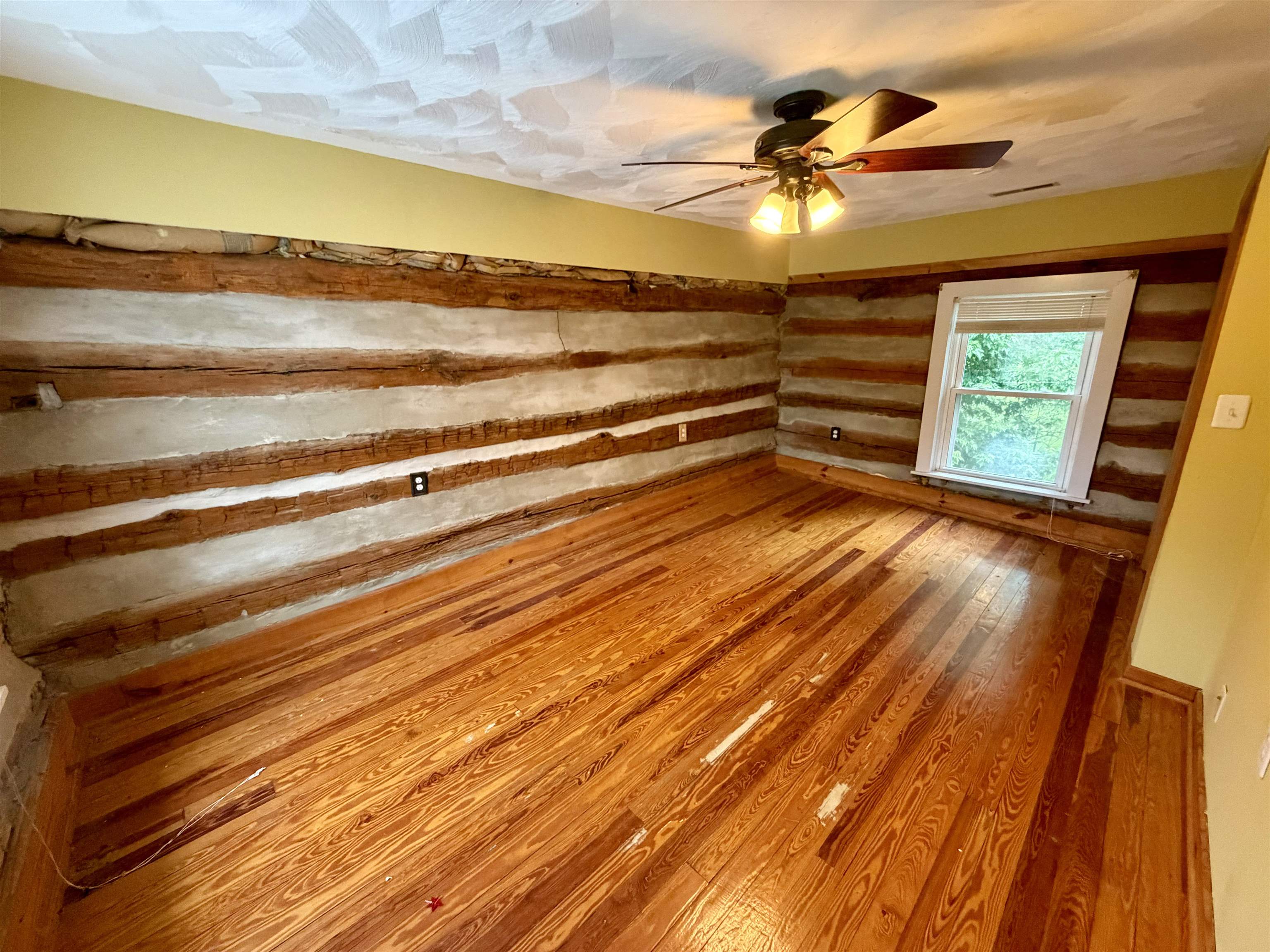 3648 Middlebrook Village Road Middlebrook, VA 24459 - Photo 20 of 48 a view of room with a ceiling fan and wooden floor