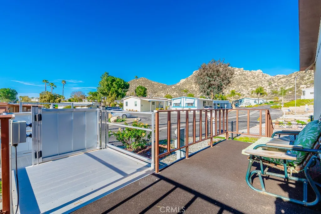 1700 South State Street, Unit 76 Hemet, CA 92543 - Photo 20 of 36 a view of a balcony with chairs