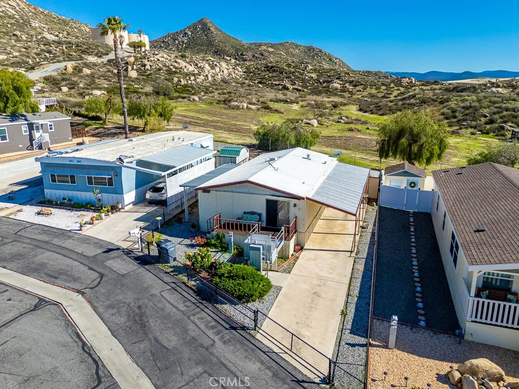 1700 South State Street, Unit 76 Hemet, CA 92543 - Photo 3 of 36 a view of a terrace with a garden