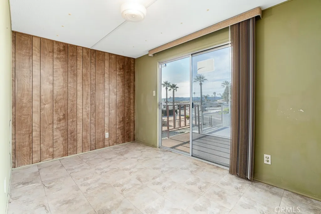 1700 South State Street, Unit 76 Hemet, CA 92543 - Photo 32 of 36 a view of entryway with wooden floor