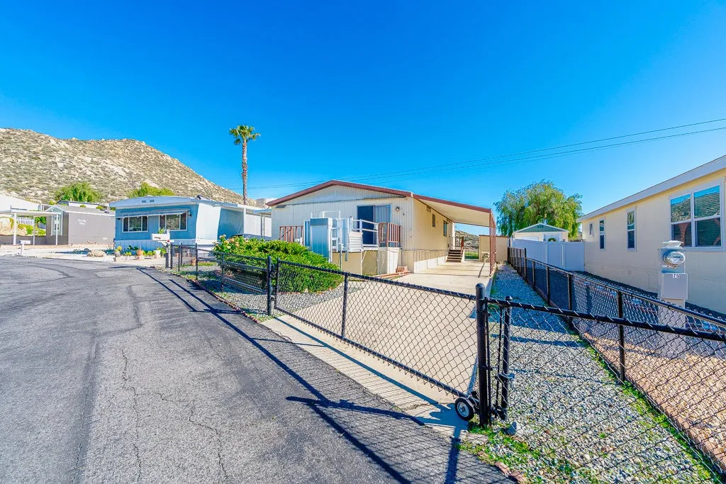 1700 South State Street, Unit 76 Hemet, CA 92543 - Photo 9 of 36 a house view with a garden space