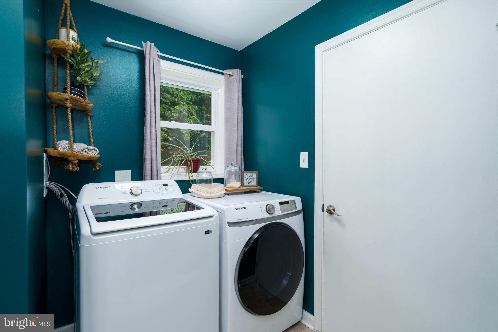 472 Upshur Drive Inwood, WV 25428 - Photo 12 of 26 a utility room with dryer and washer