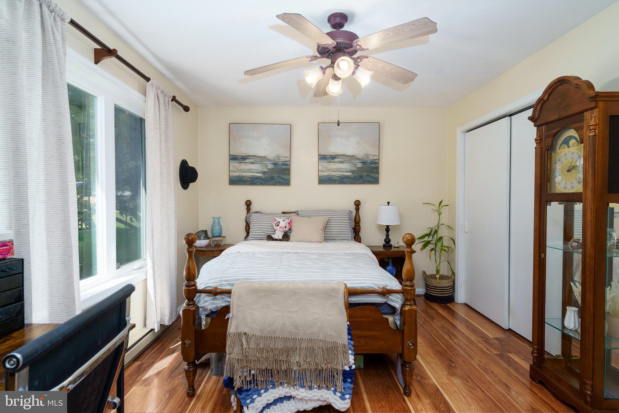 472 Upshur Drive Inwood, WV 25428 - Photo 17 of 26 a view of a dining room with furniture and wooden floor