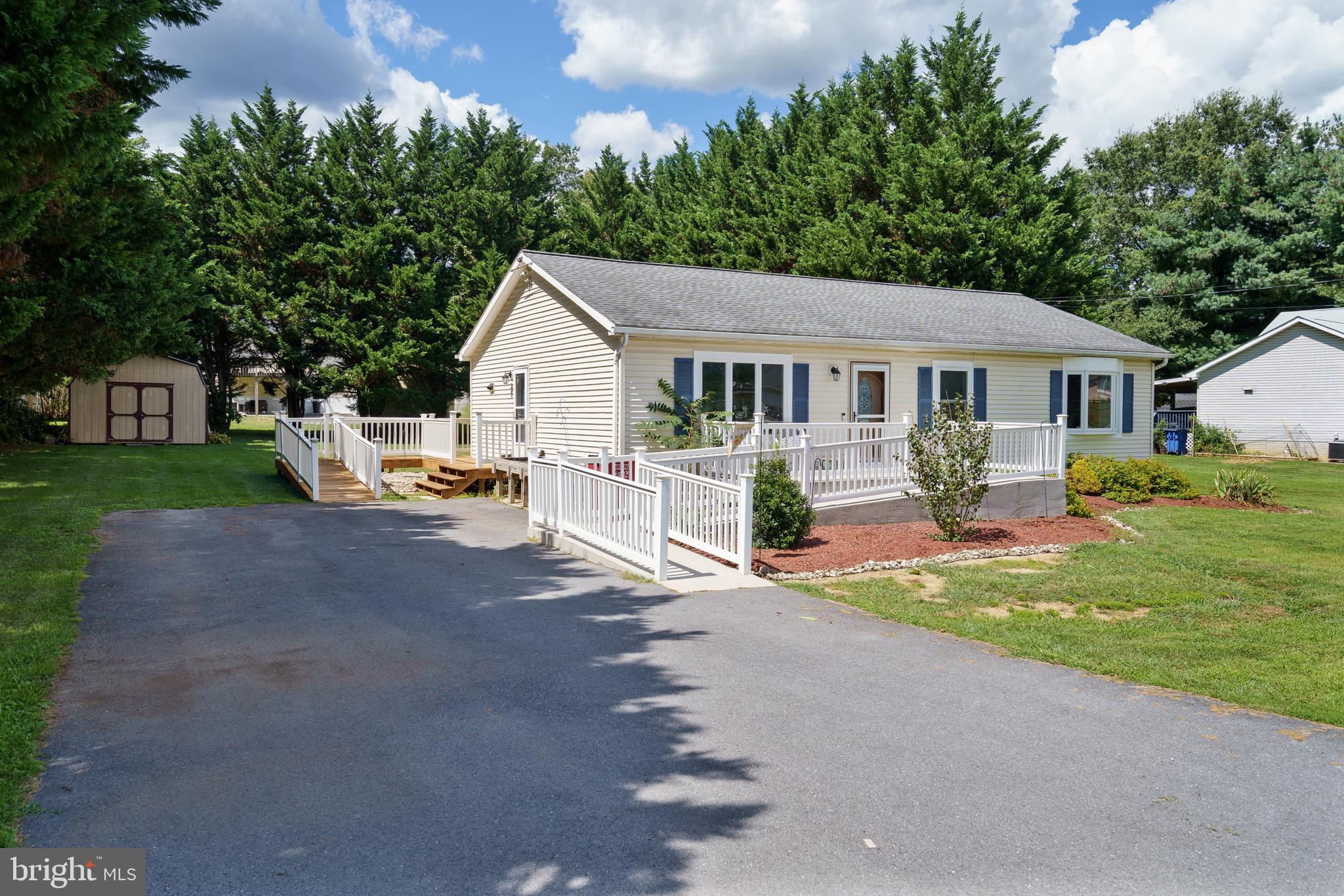 472 Upshur Drive Inwood, WV 25428 - Photo 2 of 26 a view of a house with a yard and street view