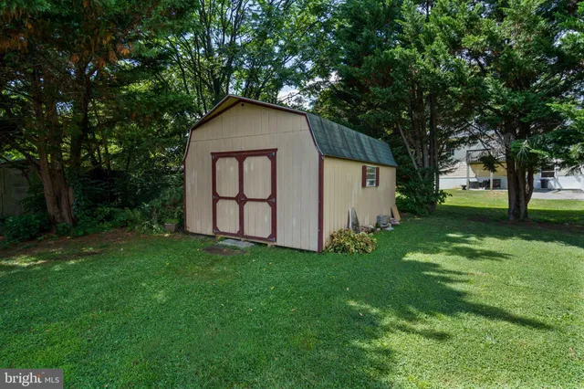 a house with garden in front of it