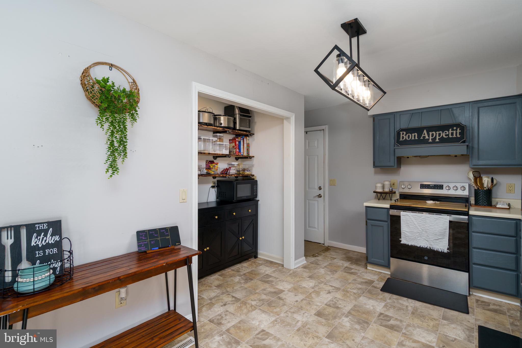 472 Upshur Drive Inwood, WV 25428 - Photo 8 of 26 a view of workspace with window and cabinet