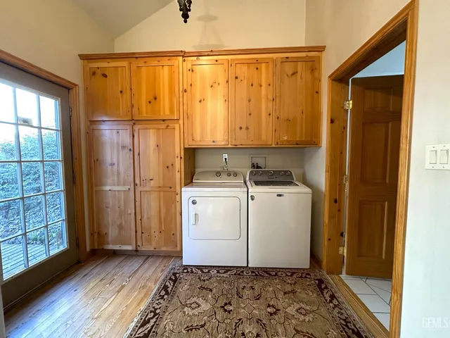 a bathroom with a shower and a tub