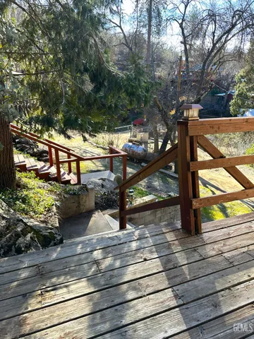 a bed room with a bed and a chair