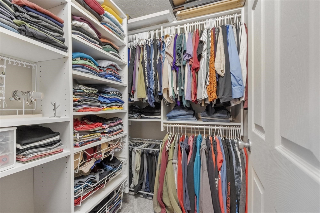 101 Williams Road Ashburnham, MA 01430 - Photo 34 of 42 a view of walk in closet with clothes and shoes