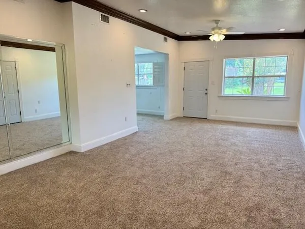 an empty room with windows