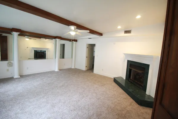 a view of a livingroom with a fireplace