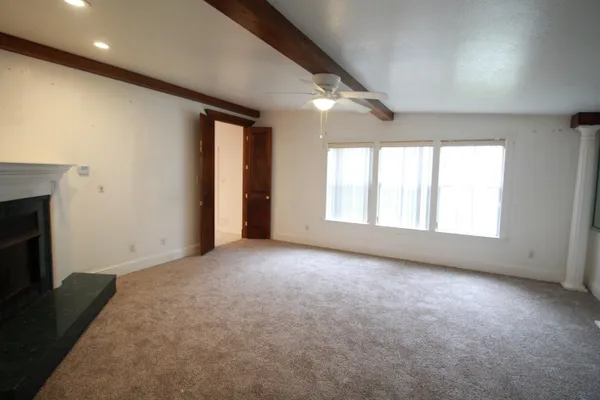 an empty room with windows