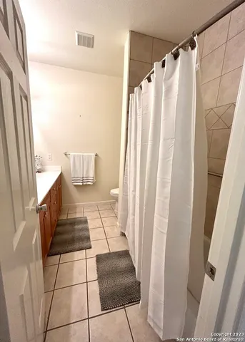 a living room with a rug