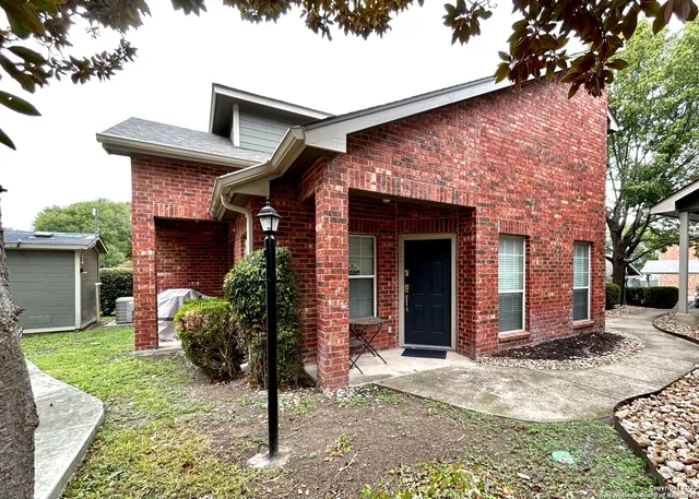 a front view of a house with a porch